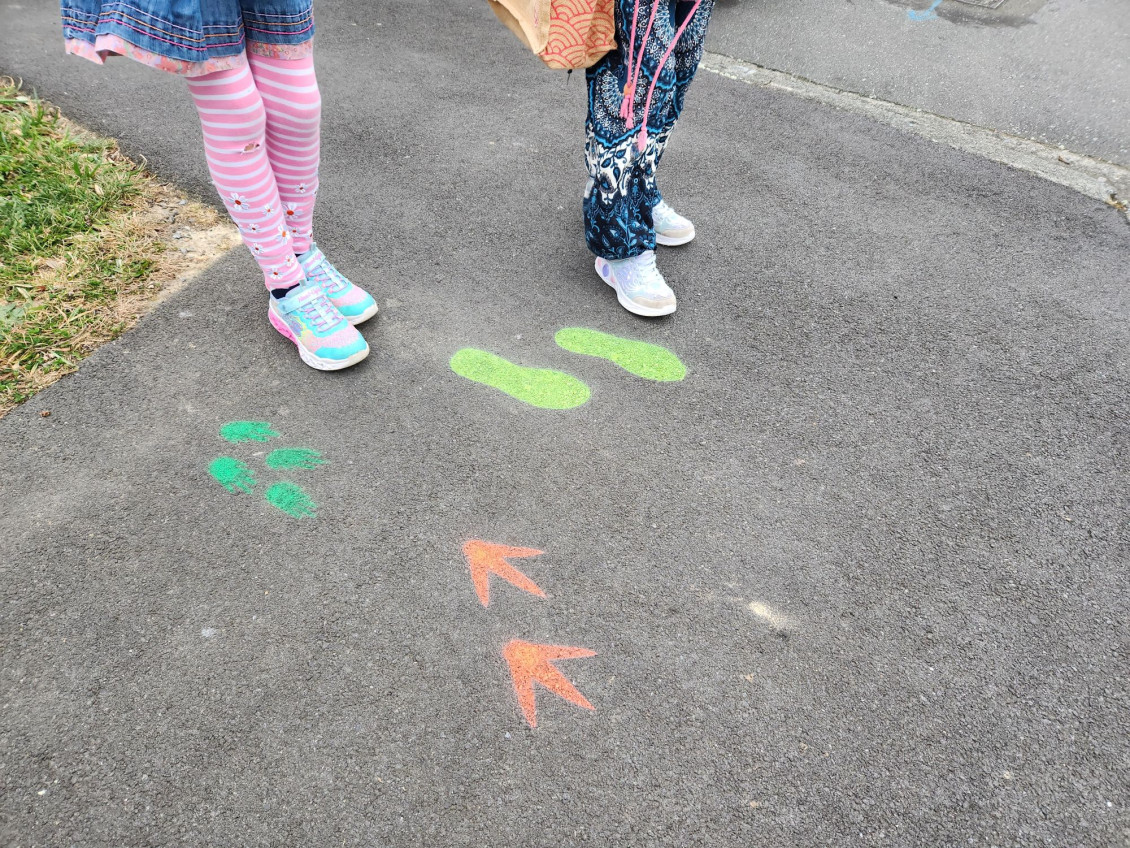 Colourful spray-painted feet guide the way to Berhampore School 